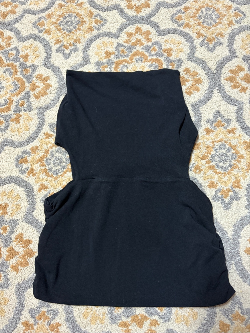 Subdued black strapless top
